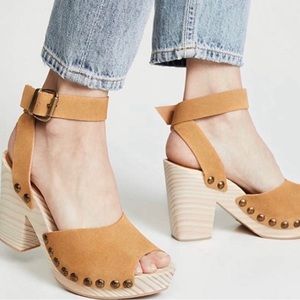 Free People Gold Suede wooden soled platforms.